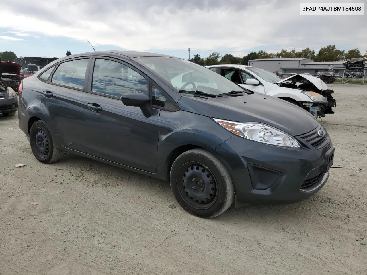 2011 Ford Fiesta S VIN: 3FADP4AJ1BM154508 Lot: 74712424