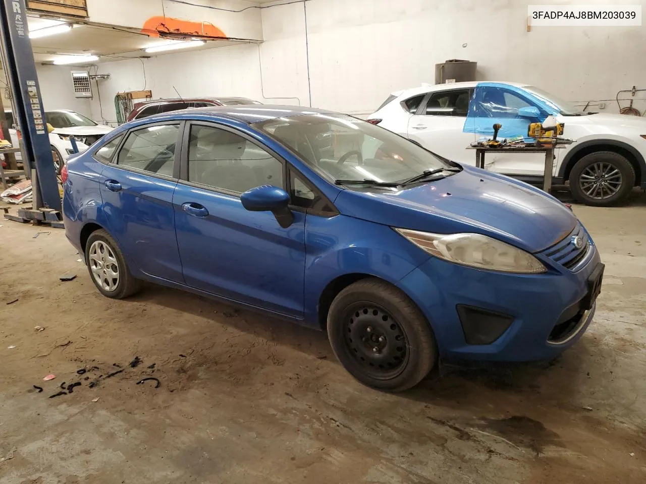 2011 Ford Fiesta S VIN: 3FADP4AJ8BM203039 Lot: 77004054