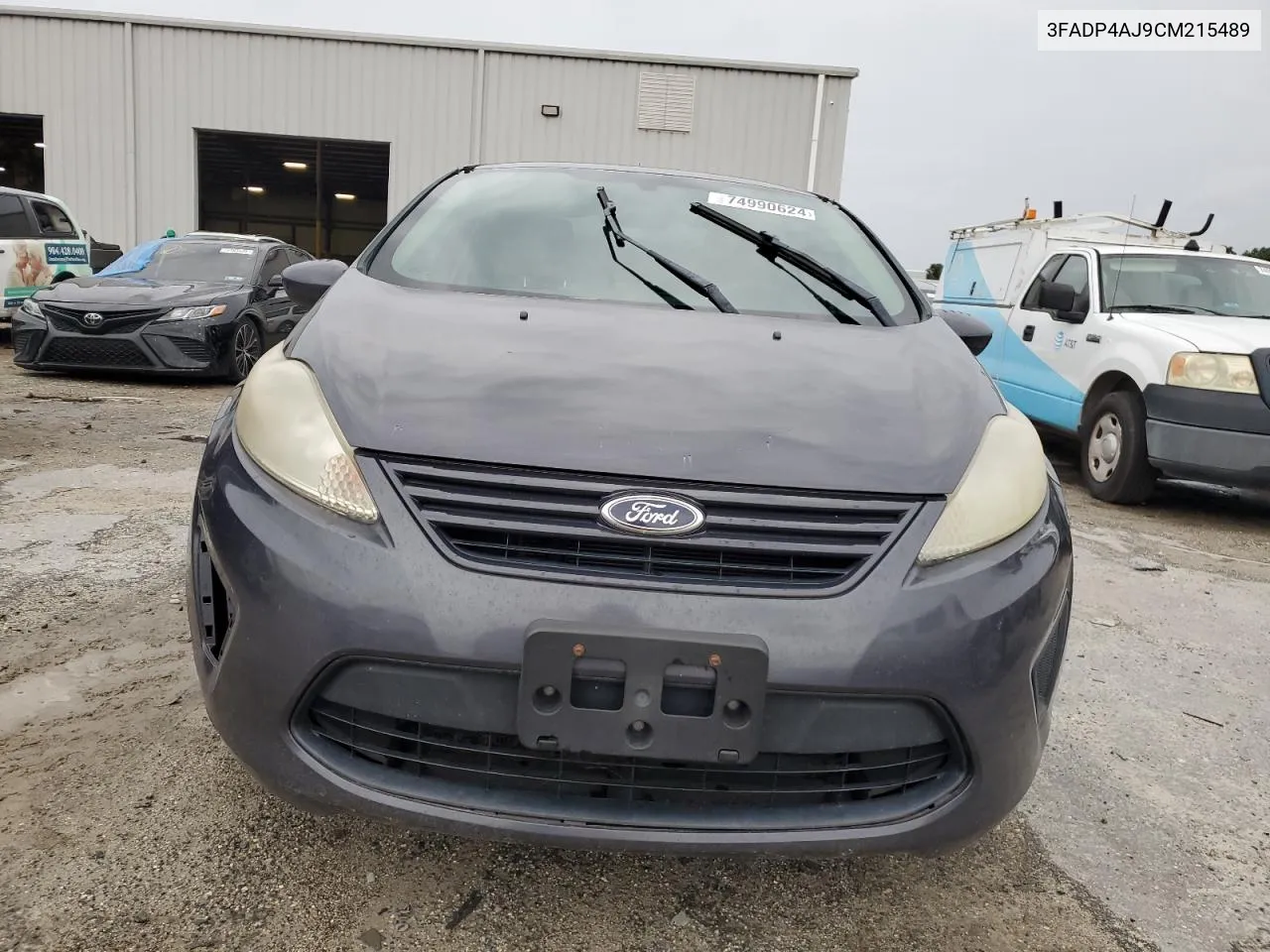 2012 Ford Fiesta S VIN: 3FADP4AJ9CM215489 Lot: 74990624