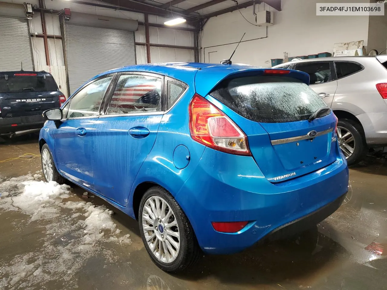 2014 Ford Fiesta Titanium VIN: 3FADP4FJ1EM103698 Lot: 82851353