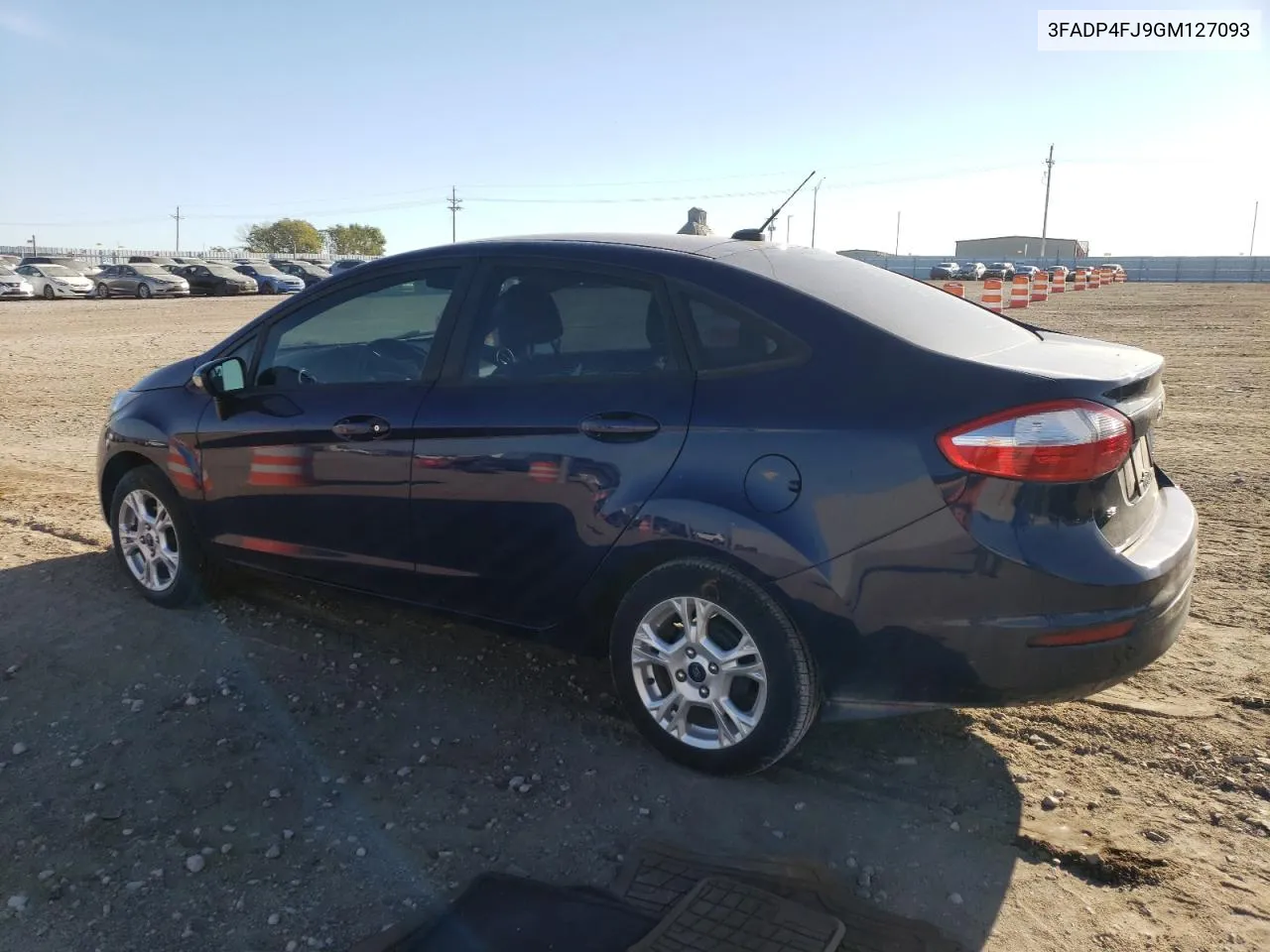 2016 Ford Fiesta Titanium VIN: 3FADP4FJ9GM127093 Lot: 70299274