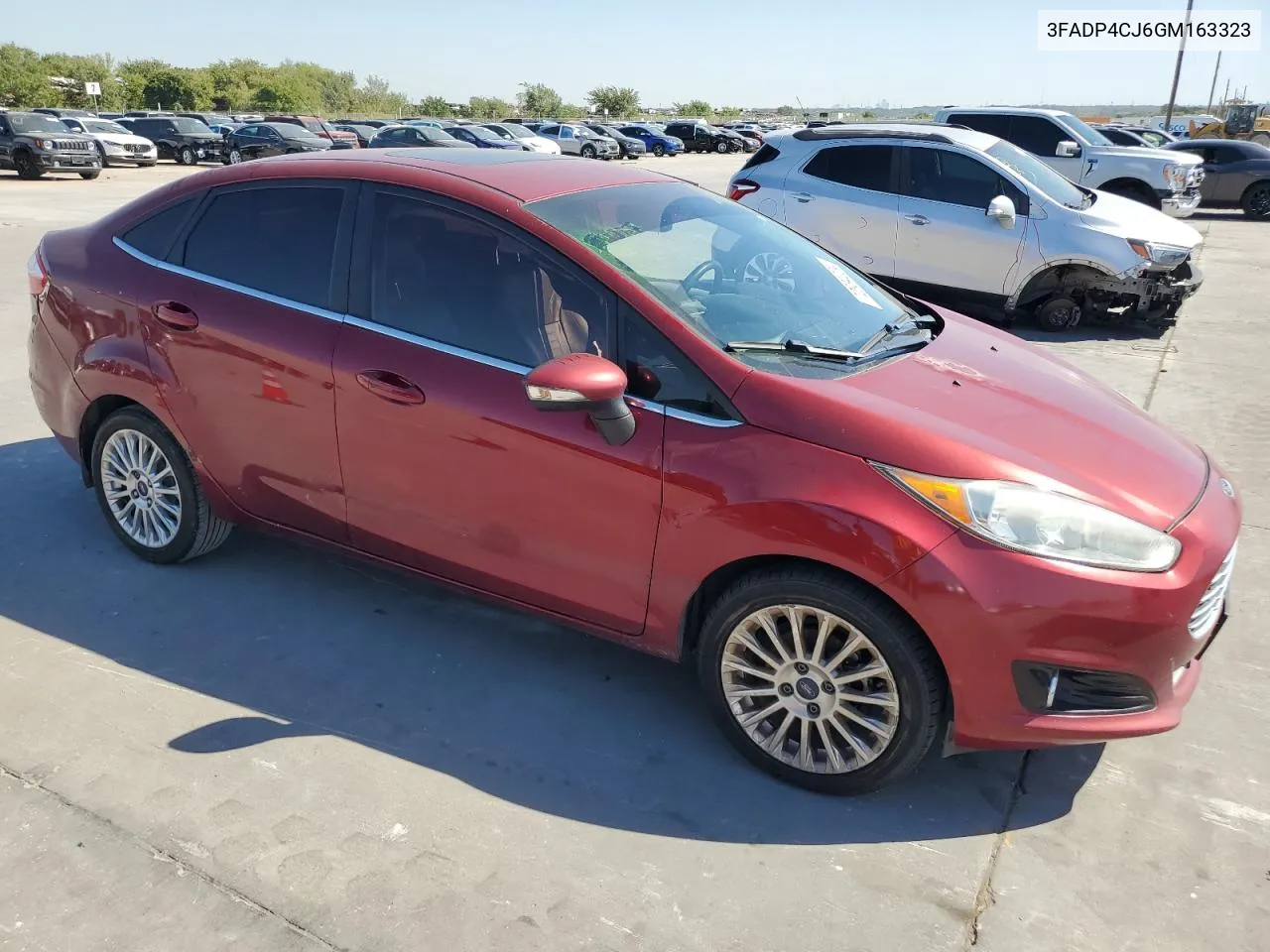 2016 Ford Fiesta Titanium VIN: 3FADP4CJ6GM163323 Lot: 72934224