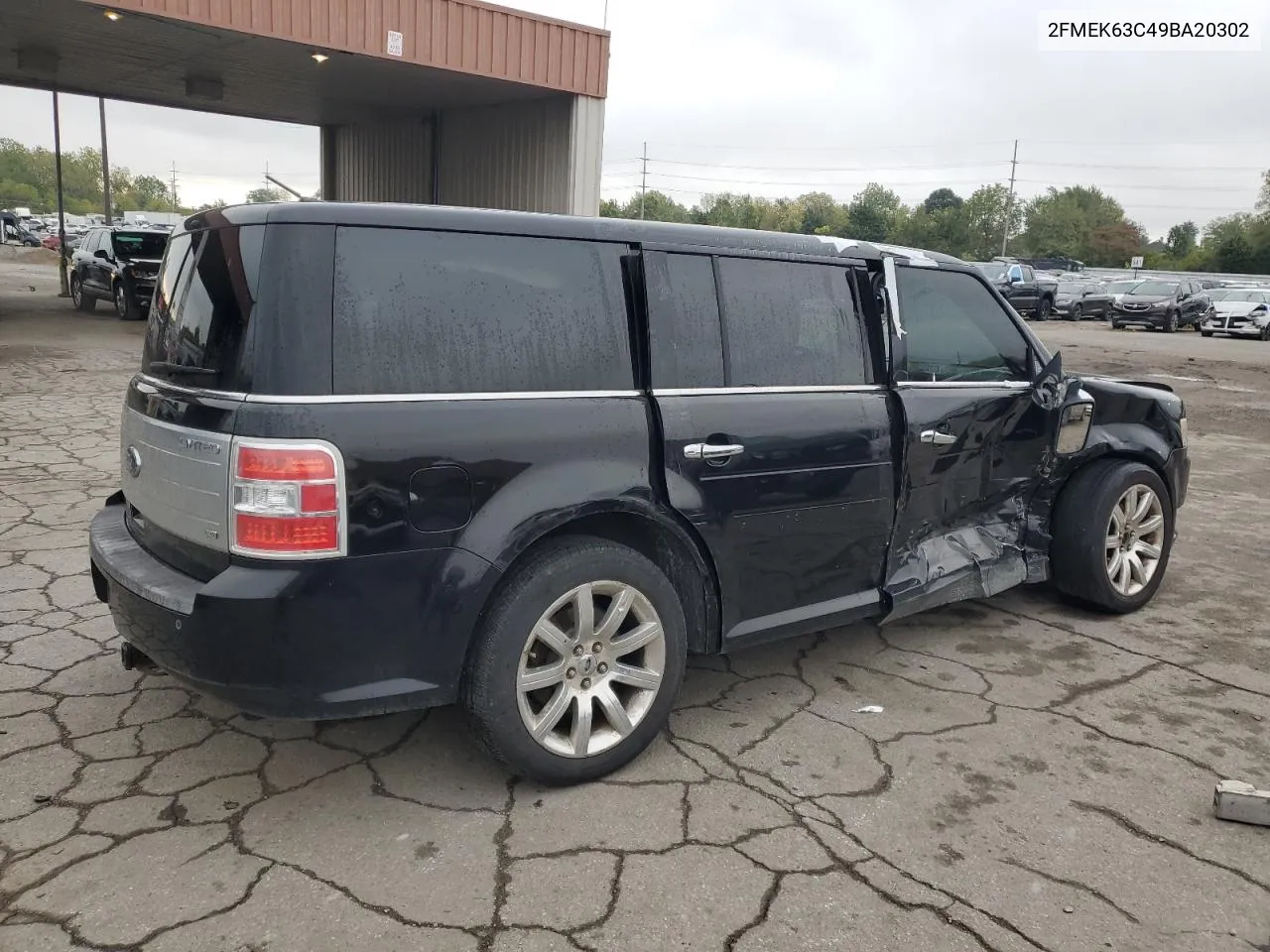 2009 Ford Flex Limited VIN: 2FMEK63C49BA20302 Lot: 73222324