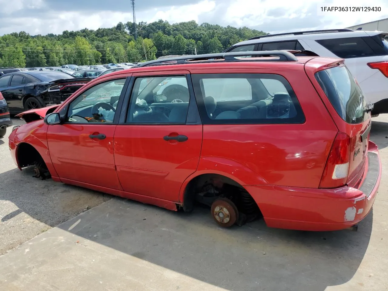 2002 Ford Focus Se VIN: 1FAFP36312W129430 Lot: 65223954