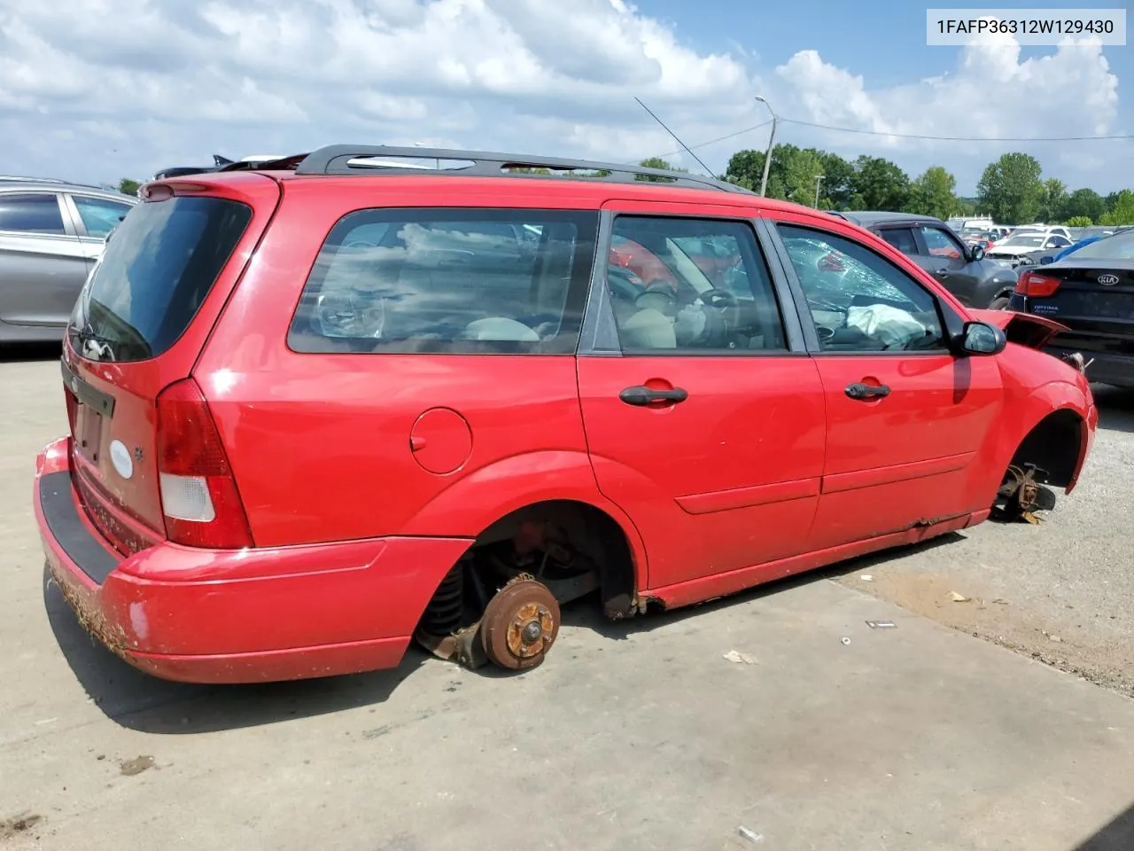 2002 Ford Focus Se VIN: 1FAFP36312W129430 Lot: 65223954