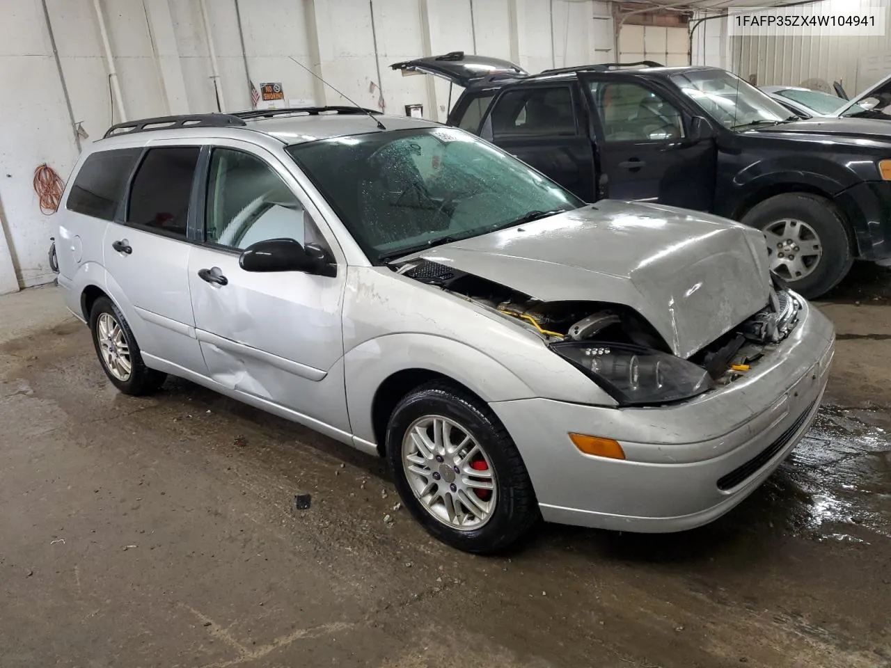 2004 Ford Focus Ztw VIN: 1FAFP35ZX4W104941 Lot: 69860274