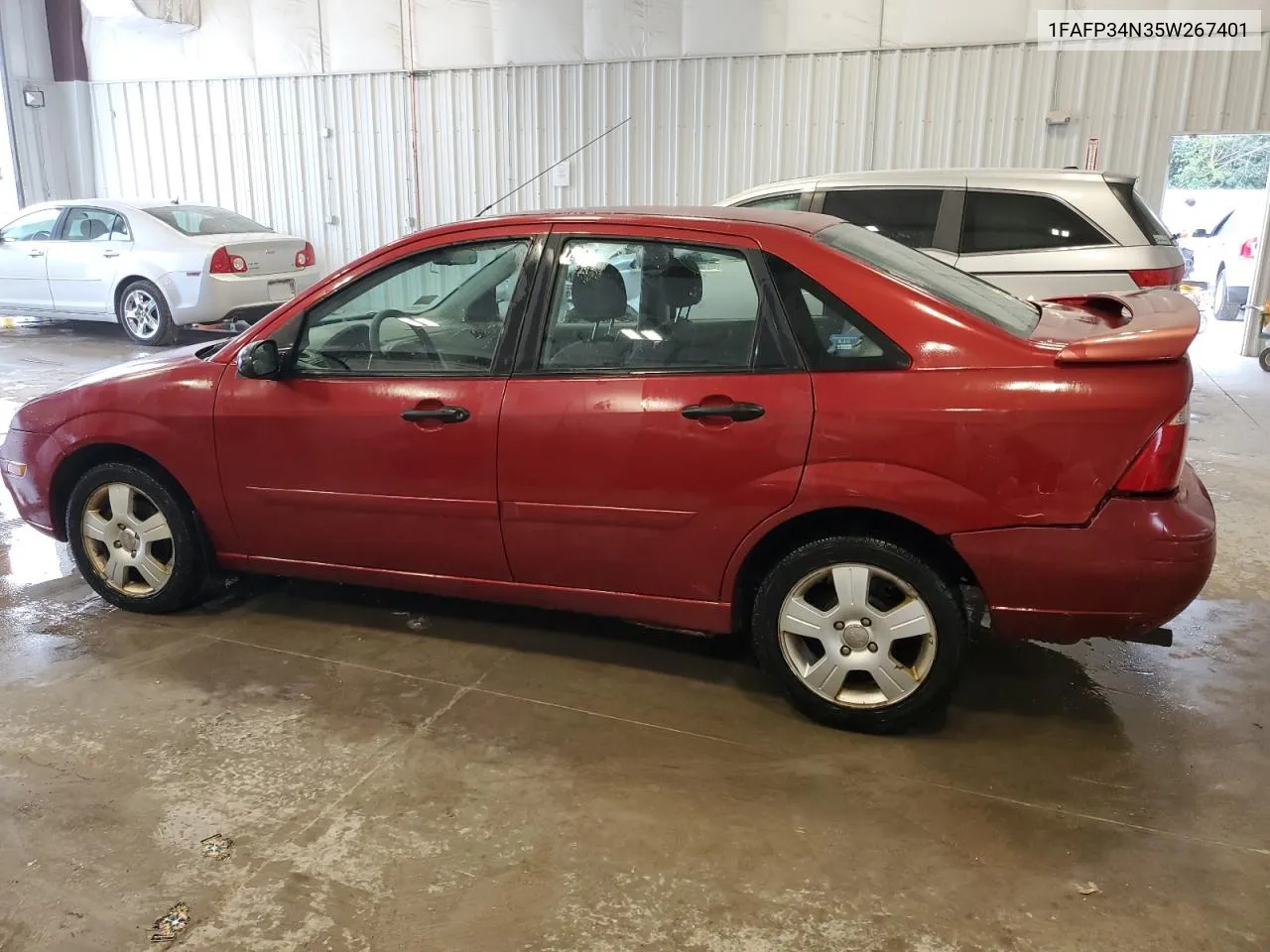 2005 Ford Focus Zx4 VIN: 1FAFP34N35W267401 Lot: 69137504