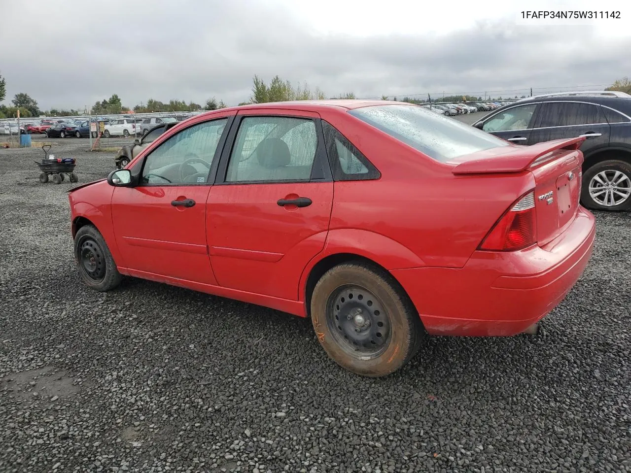 2005 Ford Focus Zx4 VIN: 1FAFP34N75W311142 Lot: 73323144