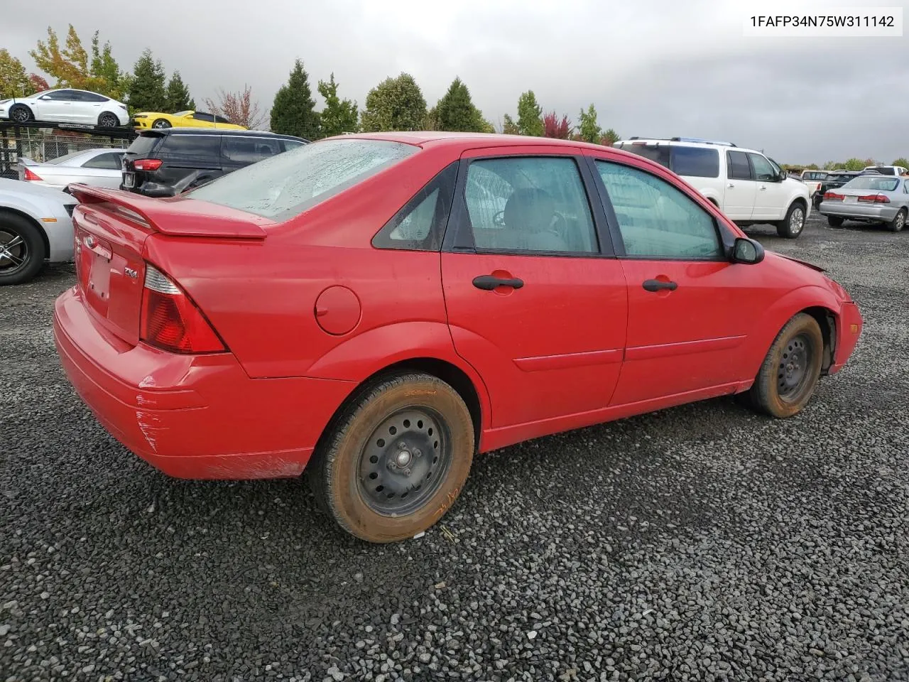 2005 Ford Focus Zx4 VIN: 1FAFP34N75W311142 Lot: 73323144