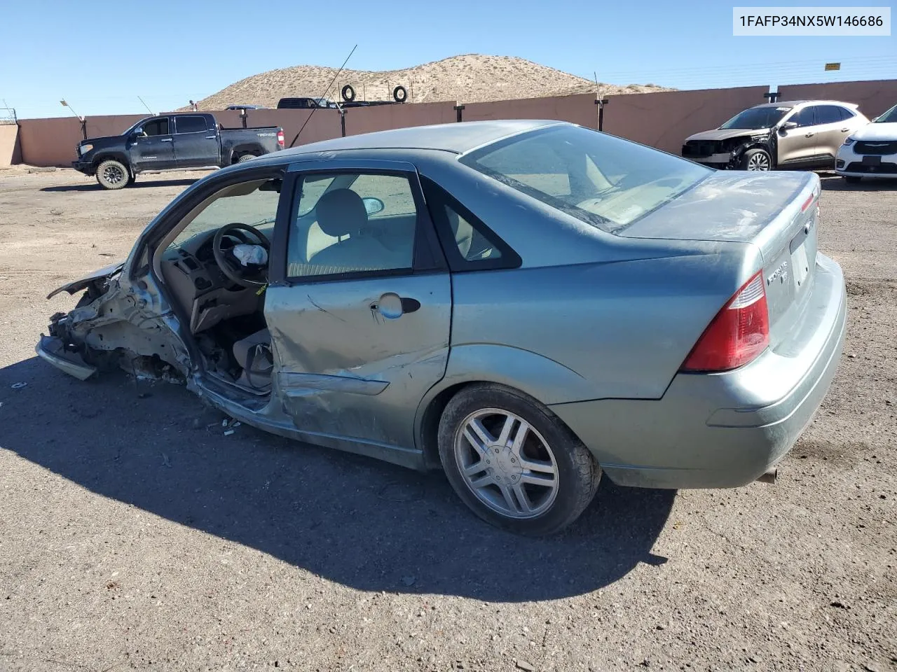 2005 Ford Focus Zx4 VIN: 1FAFP34NX5W146686 Lot: 76389104