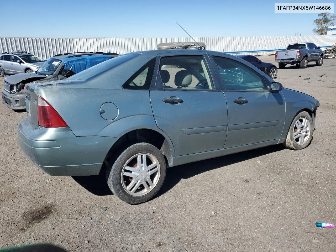 2005 Ford Focus Zx4 VIN: 1FAFP34NX5W146686 Lot: 76389104