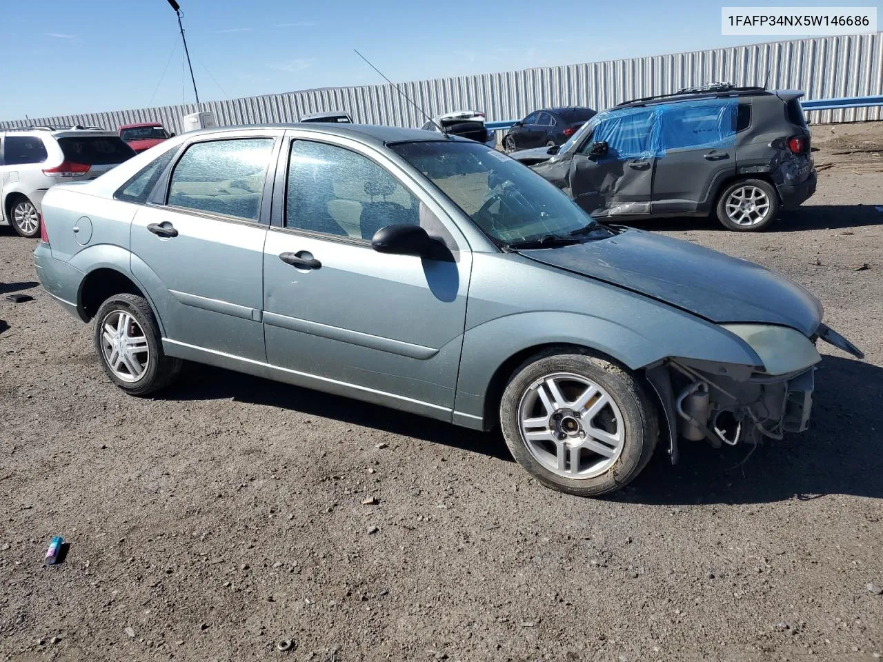 2005 Ford Focus Zx4 VIN: 1FAFP34NX5W146686 Lot: 76389104