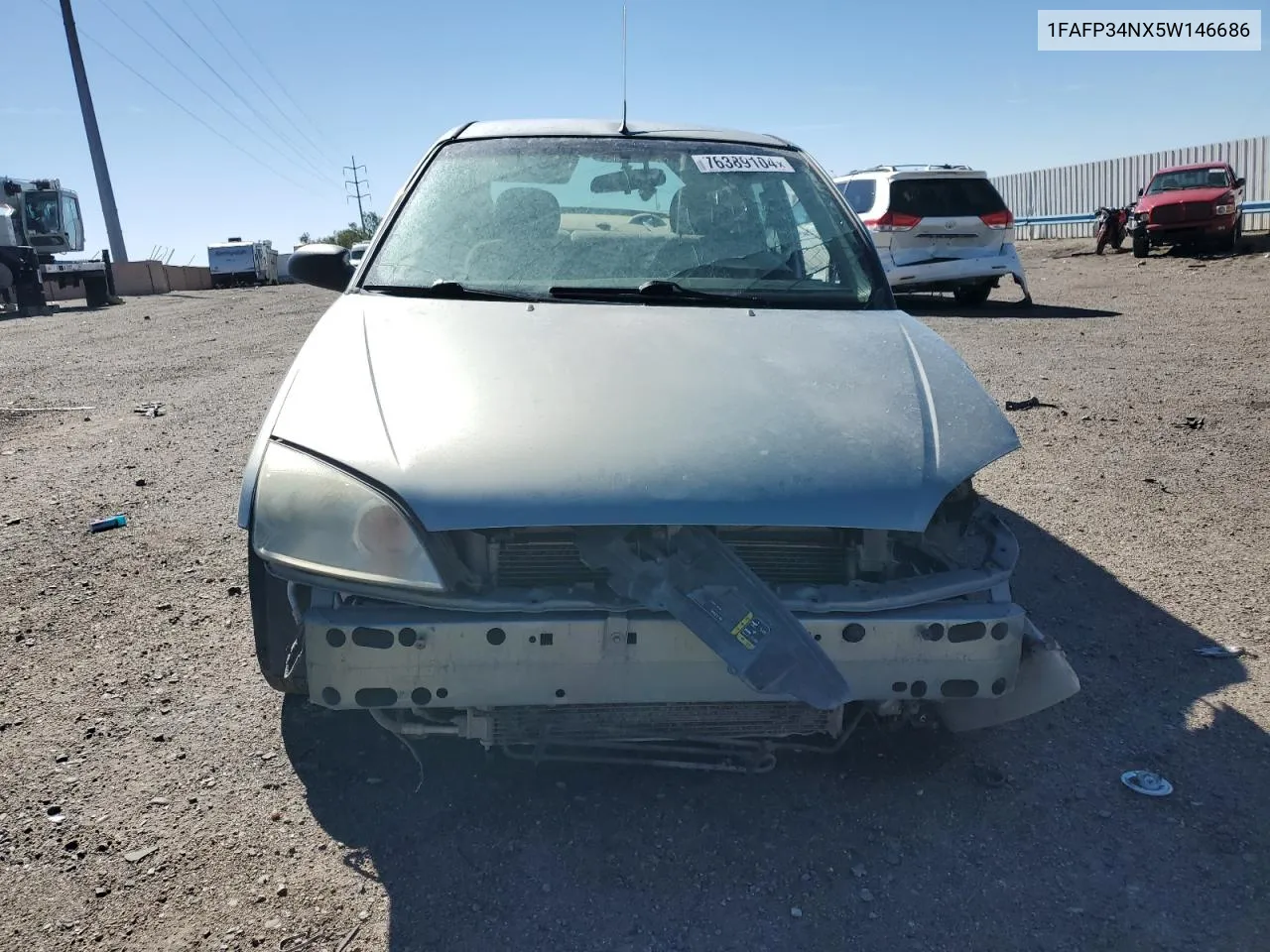 2005 Ford Focus Zx4 VIN: 1FAFP34NX5W146686 Lot: 76389104