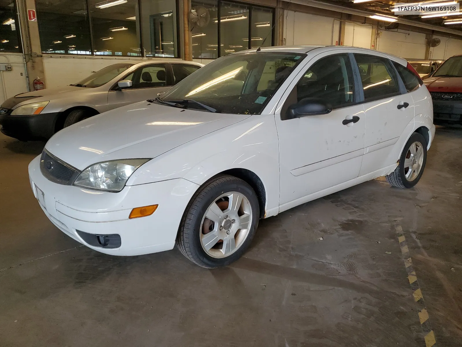 2006 Ford Focus Zx5 VIN: 1FAFP37N16W169108 Lot: 59187834