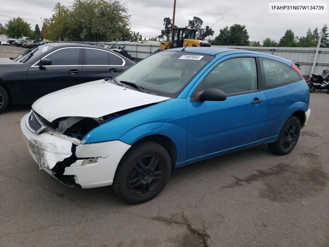 2007 Ford Focus Zx3 VIN: 1FAHP31N07W134739 Lot: 71582664