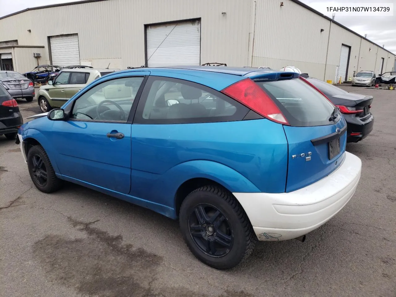 2007 Ford Focus Zx3 VIN: 1FAHP31N07W134739 Lot: 71582664