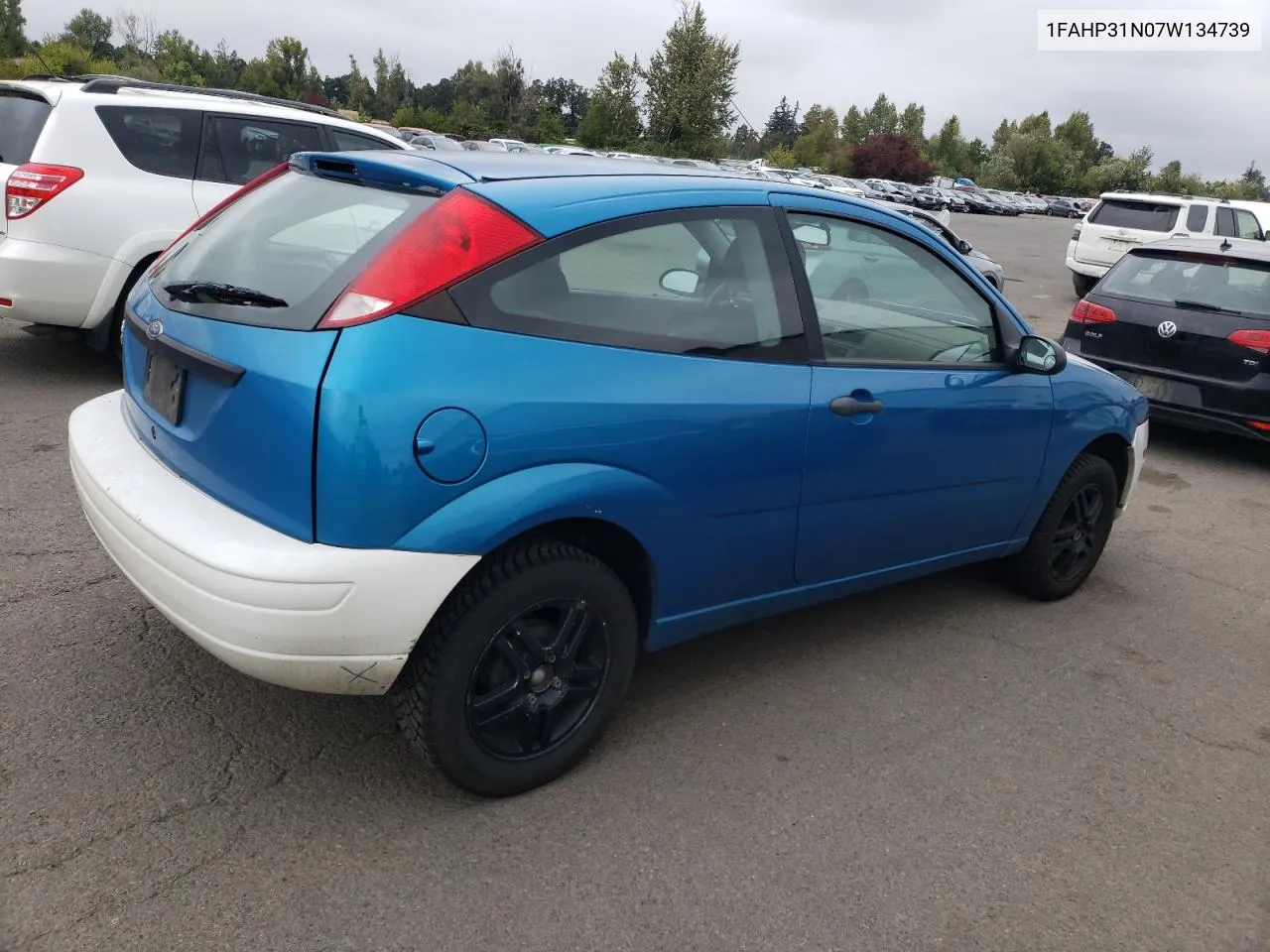 2007 Ford Focus Zx3 VIN: 1FAHP31N07W134739 Lot: 71582664