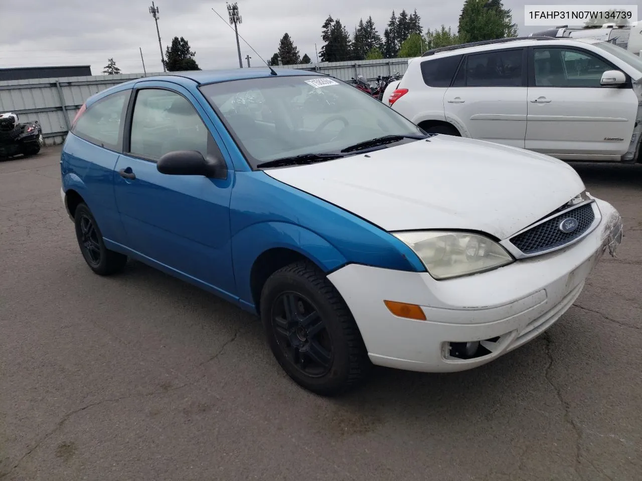 2007 Ford Focus Zx3 VIN: 1FAHP31N07W134739 Lot: 71582664