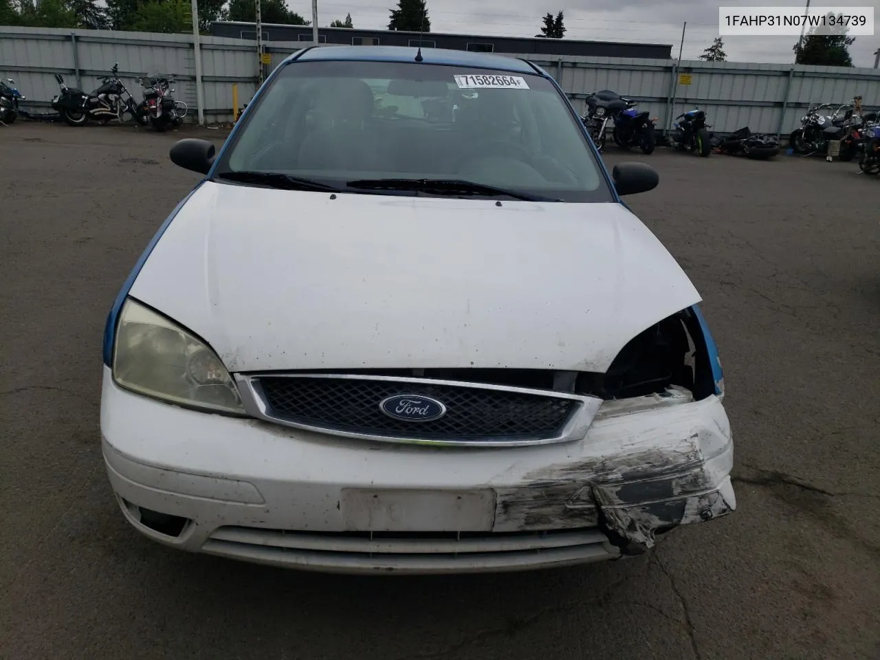 2007 Ford Focus Zx3 VIN: 1FAHP31N07W134739 Lot: 71582664