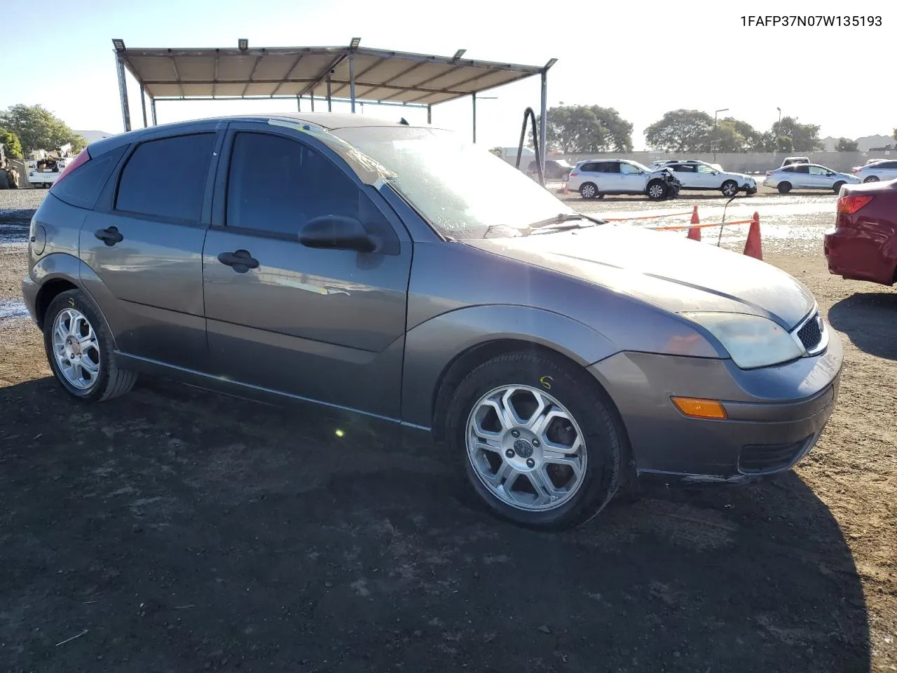 2007 Ford Focus Zx5 VIN: 1FAFP37N07W135193 Lot: 79046164