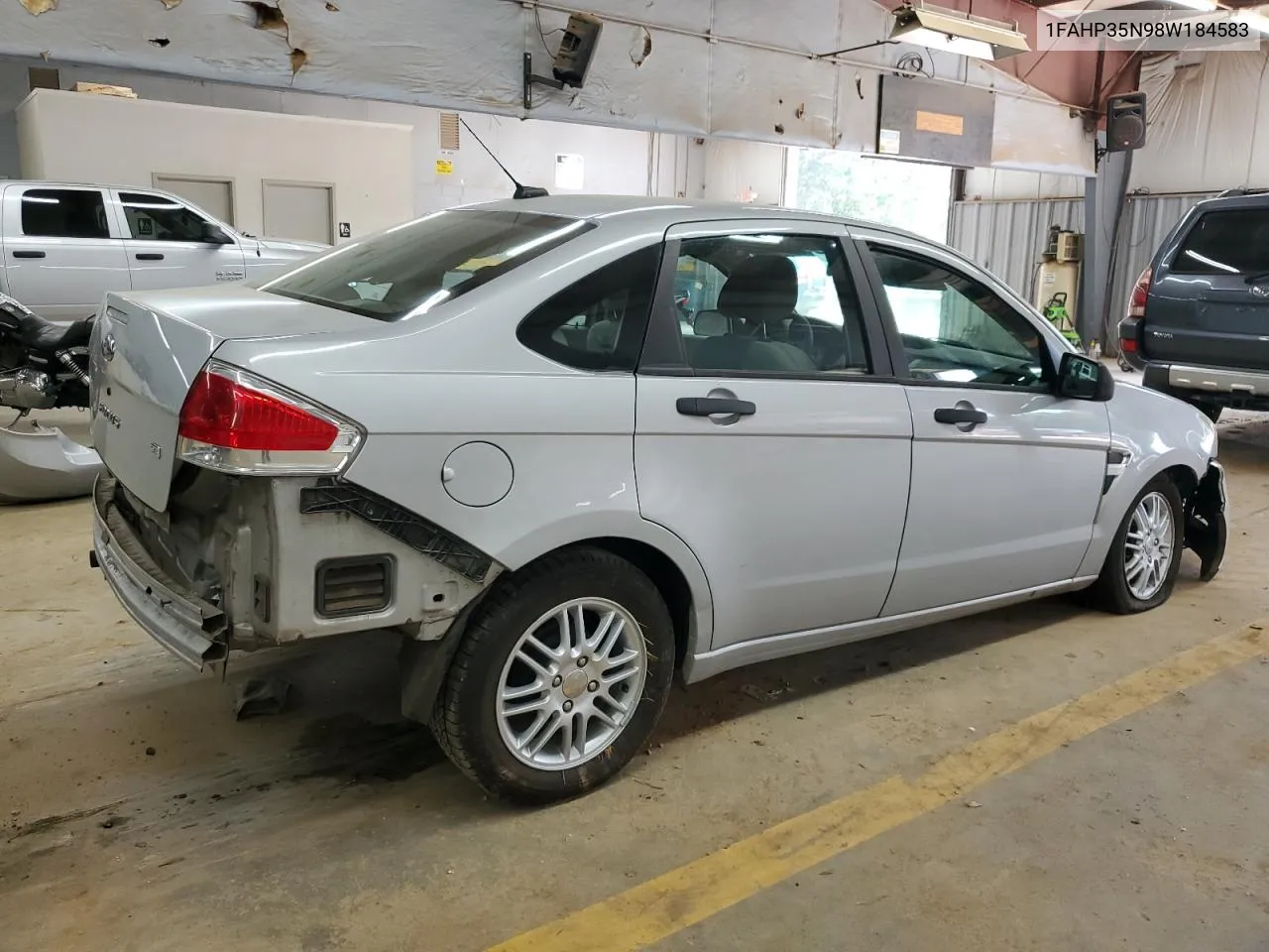 2008 Ford Focus Se VIN: 1FAHP35N98W184583 Lot: 63604564