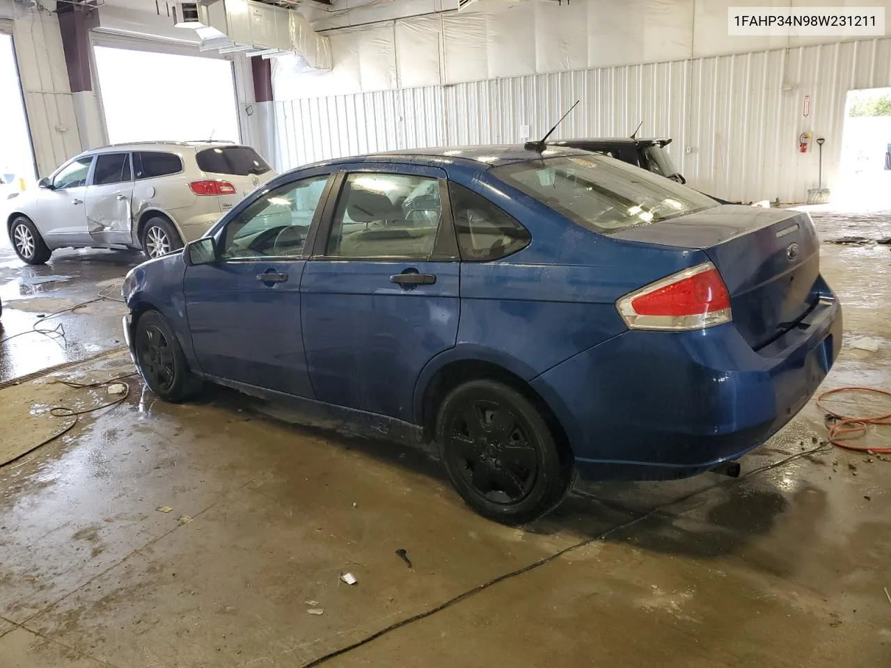 2008 Ford Focus S/Se VIN: 1FAHP34N98W231211 Lot: 75745404