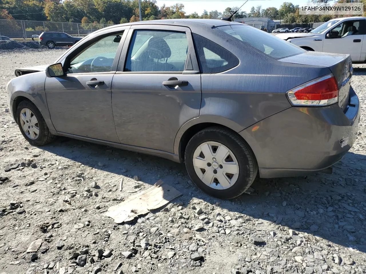 2009 Ford Focus S VIN: 1FAHP34NX9W129126 Lot: 76801094