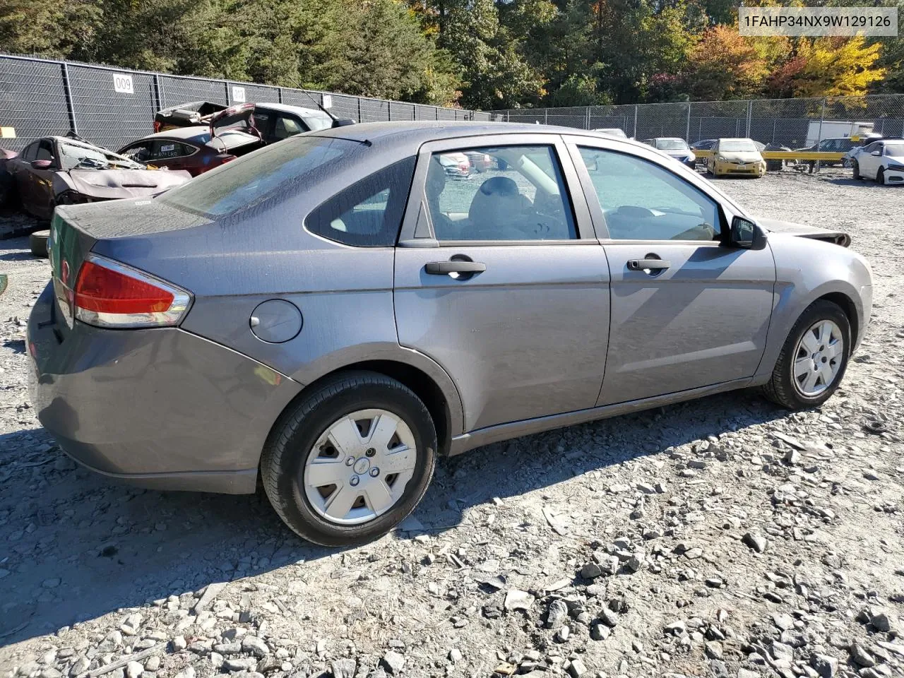 2009 Ford Focus S VIN: 1FAHP34NX9W129126 Lot: 76801094