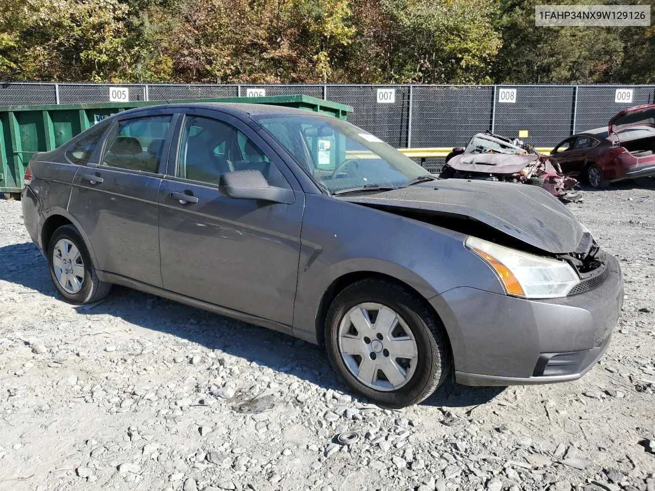 2009 Ford Focus S VIN: 1FAHP34NX9W129126 Lot: 76801094