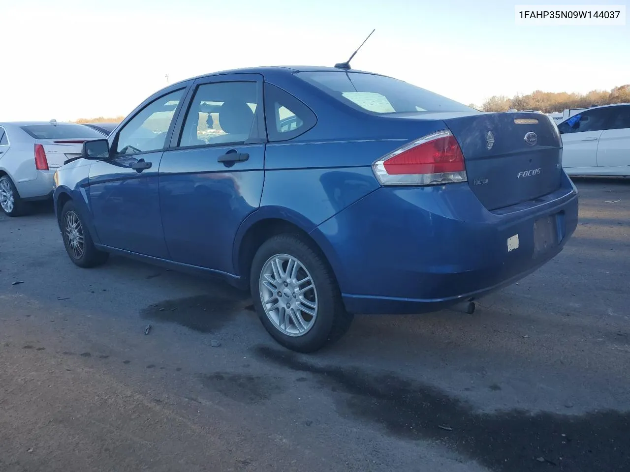 2009 Ford Focus Se VIN: 1FAHP35N09W144037 Lot: 79697004