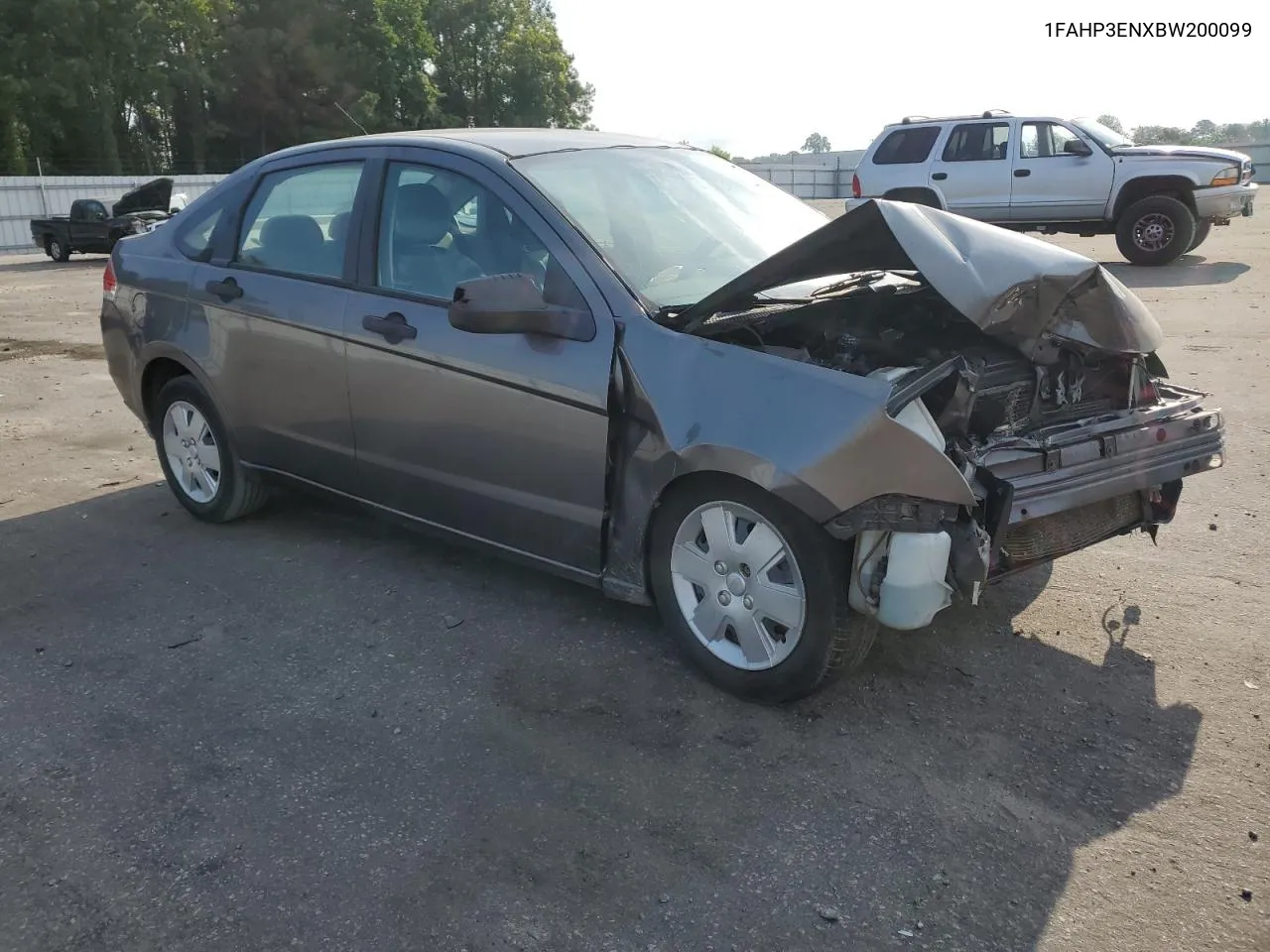 2011 Ford Focus S VIN: 1FAHP3ENXBW200099 Lot: 69402914