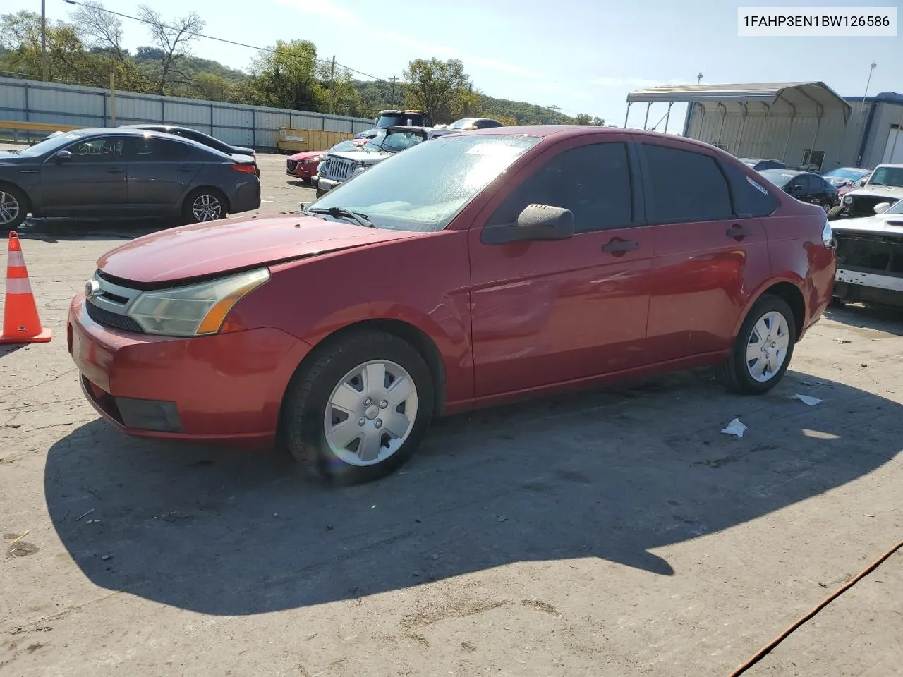 2011 Ford Focus S VIN: 1FAHP3EN1BW126586 Lot: 70021004