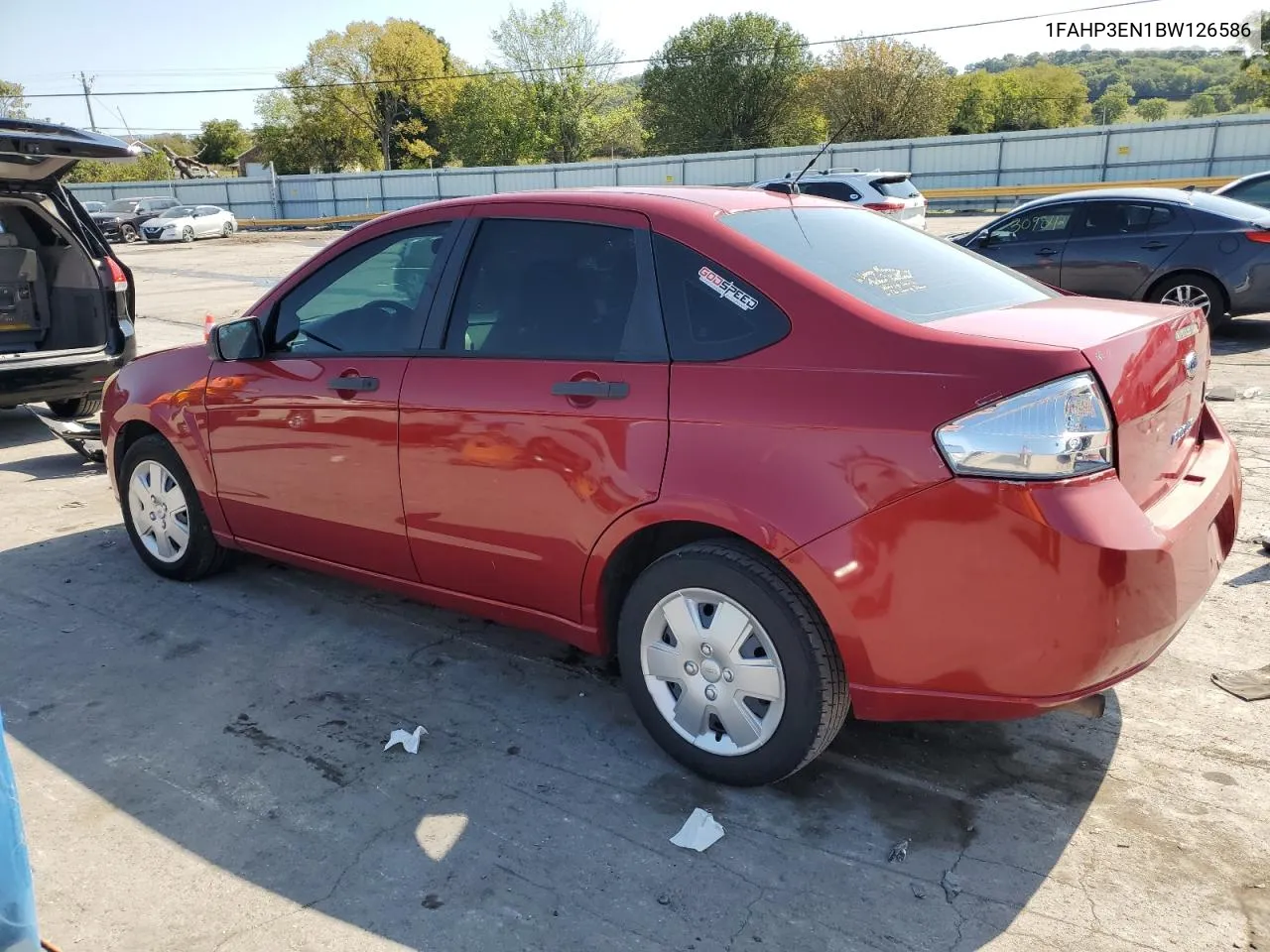 2011 Ford Focus S VIN: 1FAHP3EN1BW126586 Lot: 70021004