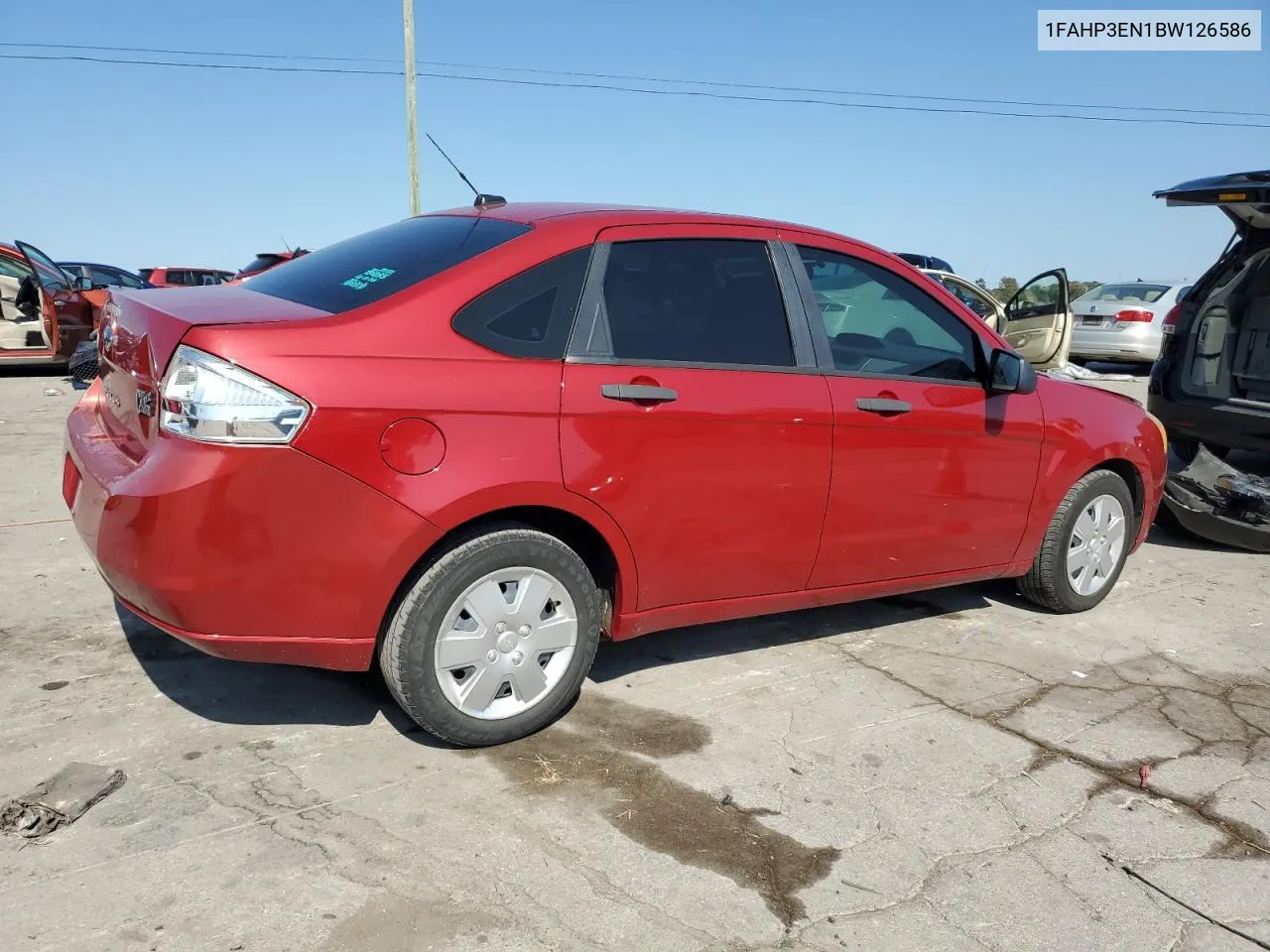 2011 Ford Focus S VIN: 1FAHP3EN1BW126586 Lot: 70021004