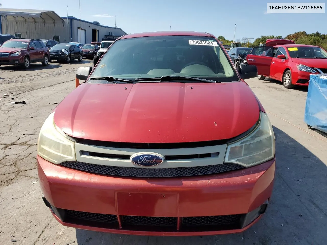 2011 Ford Focus S VIN: 1FAHP3EN1BW126586 Lot: 70021004