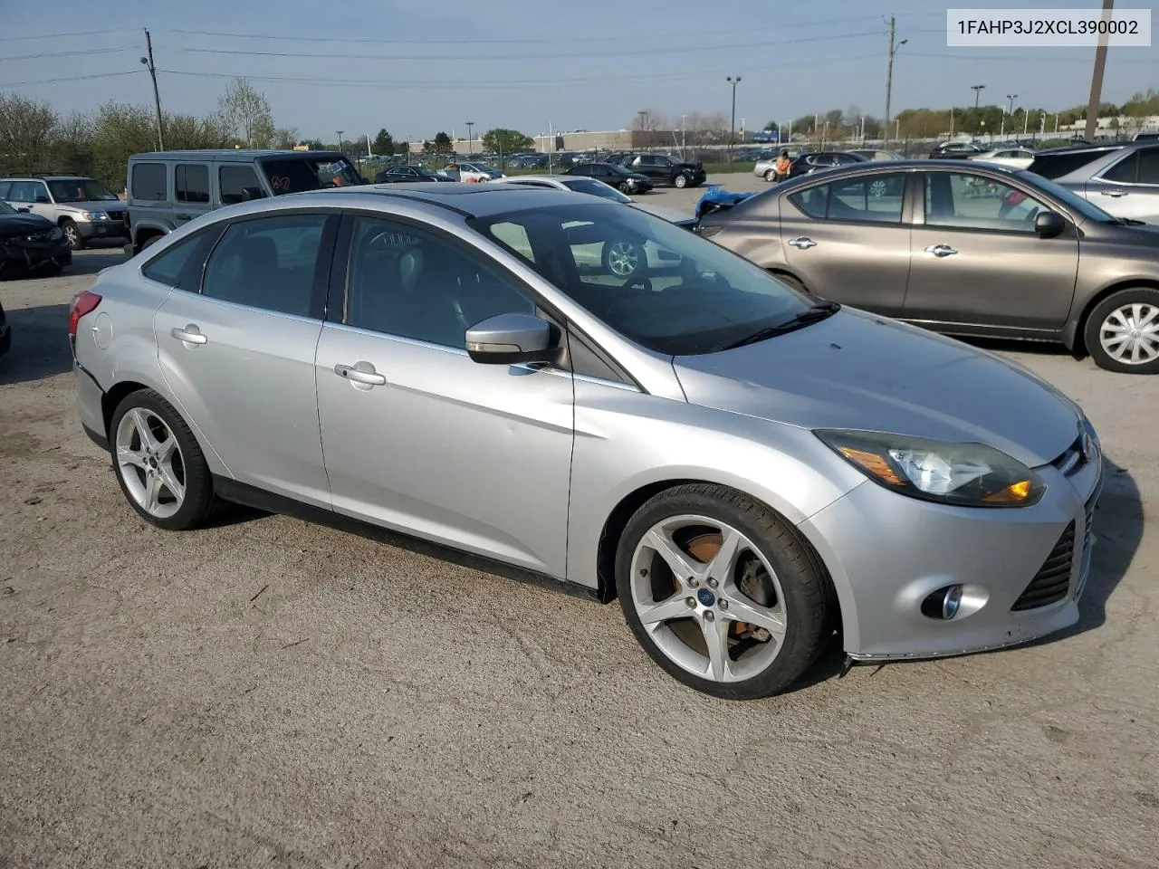 2012 Ford Focus Titanium VIN: 1FAHP3J2XCL390002 Lot: 51000764