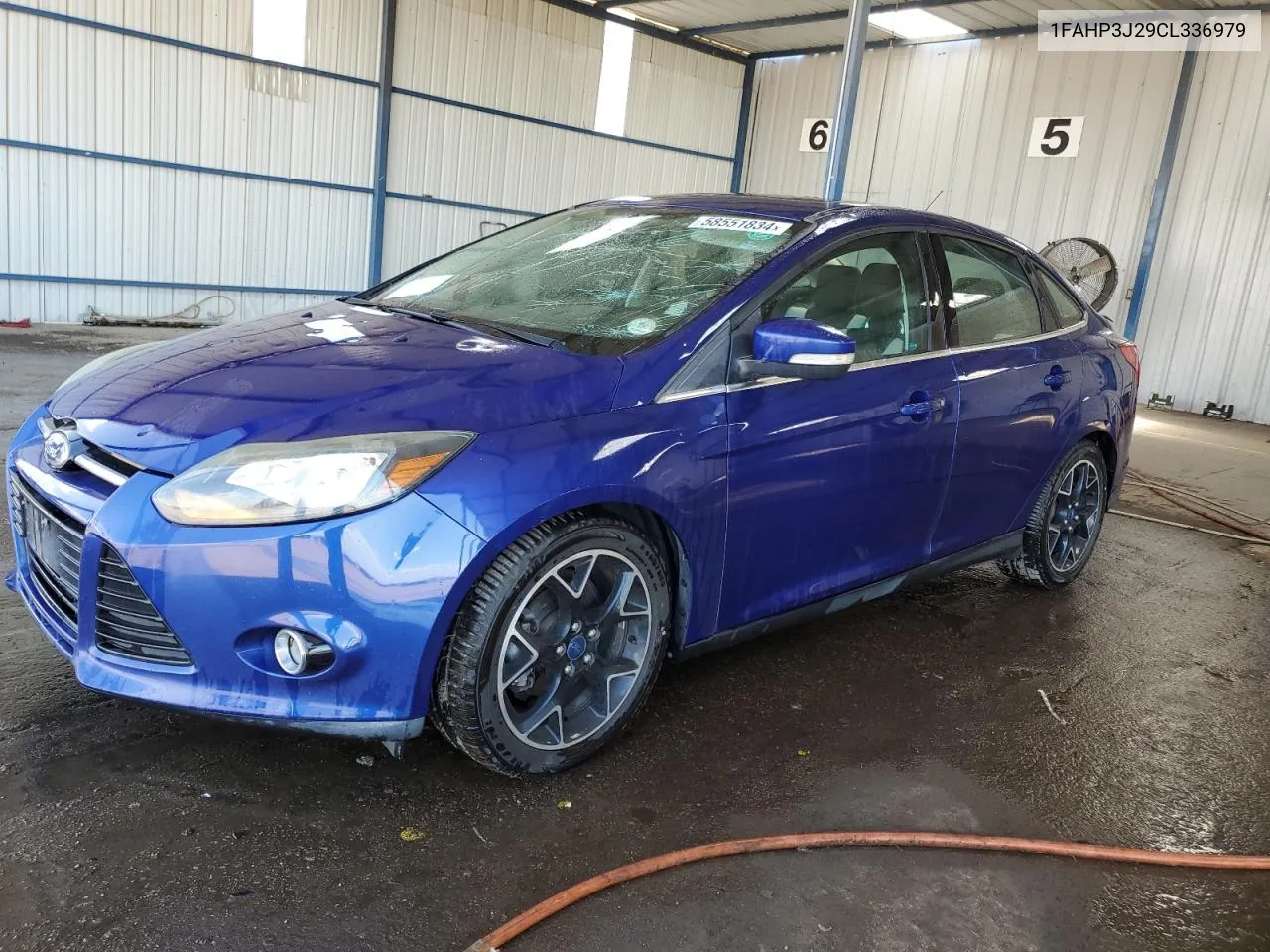 2012 Ford Focus Titanium VIN: 1FAHP3J29CL336979 Lot: 58551834