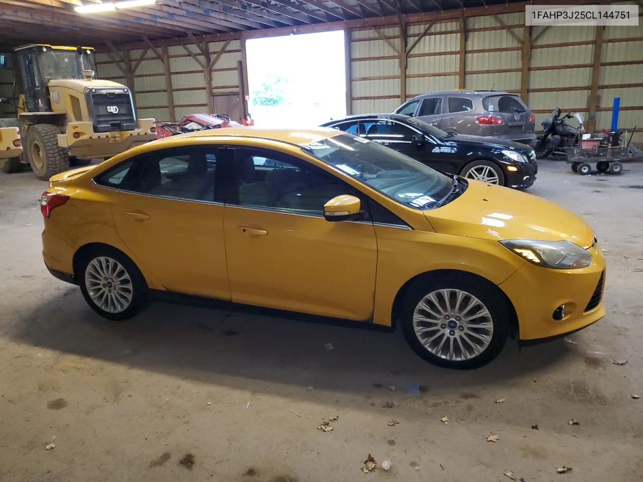 2012 Ford Focus Titanium VIN: 1FAHP3J25CL144751 Lot: 58602464