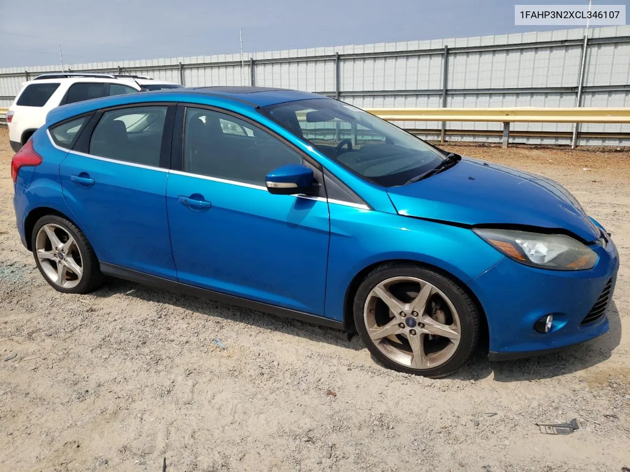 2012 Ford Focus Titanium VIN: 1FAHP3N2XCL346107 Lot: 58863624