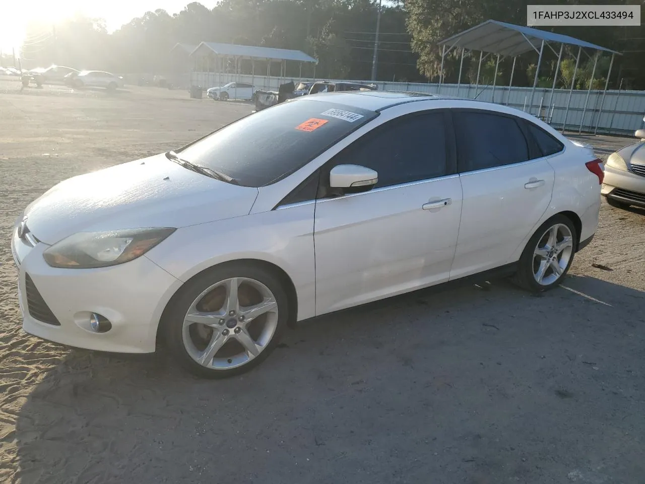 2012 Ford Focus Titanium VIN: 1FAHP3J2XCL433494 Lot: 69564144