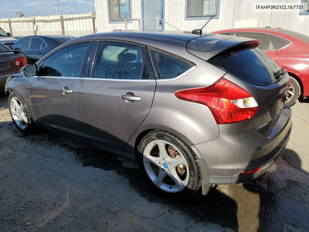 2012 Ford Focus Titanium VIN: 1FAHP3N21CL167731 Lot: 69990244