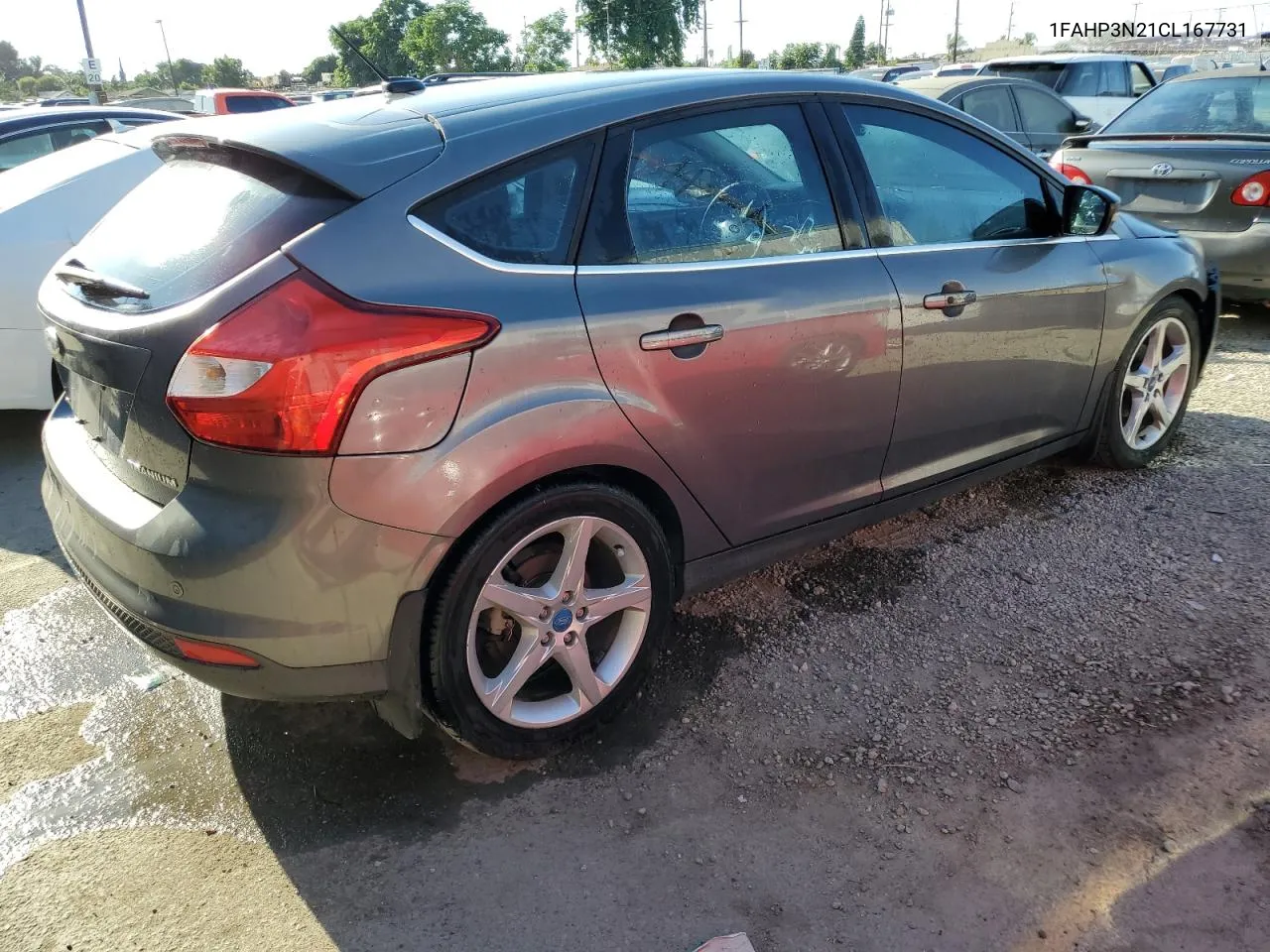 2012 Ford Focus Titanium VIN: 1FAHP3N21CL167731 Lot: 69990244