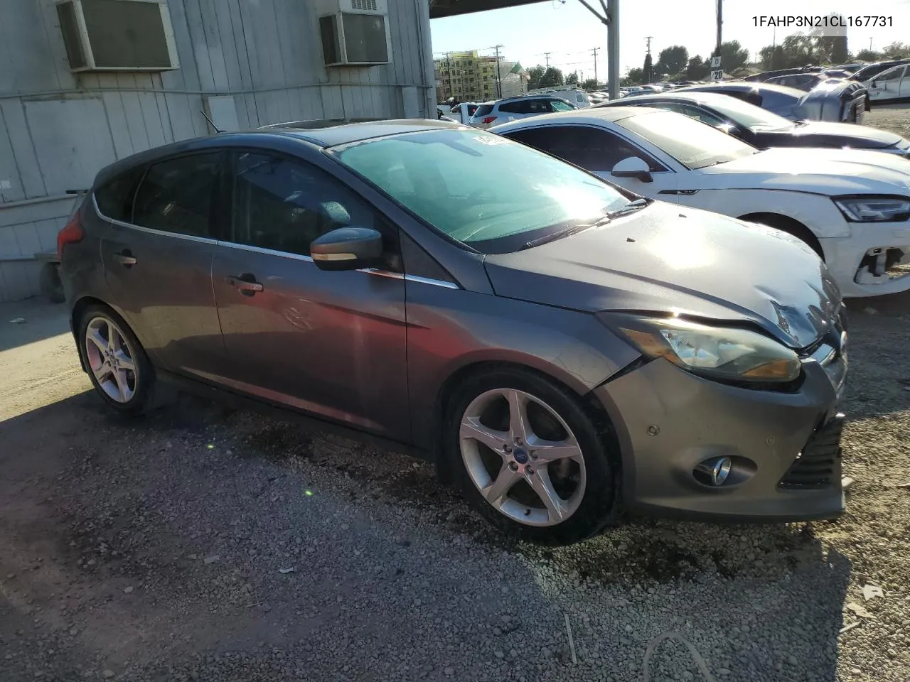 2012 Ford Focus Titanium VIN: 1FAHP3N21CL167731 Lot: 69990244