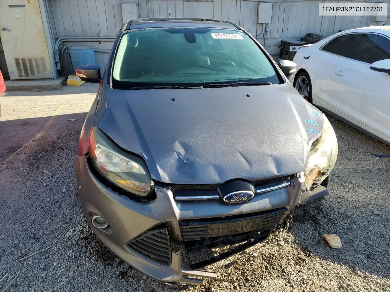 2012 Ford Focus Titanium VIN: 1FAHP3N21CL167731 Lot: 69990244