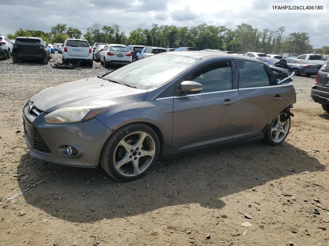 2012 Ford Focus Titanium VIN: 1FAHP3J26CL406180 Lot: 70565904