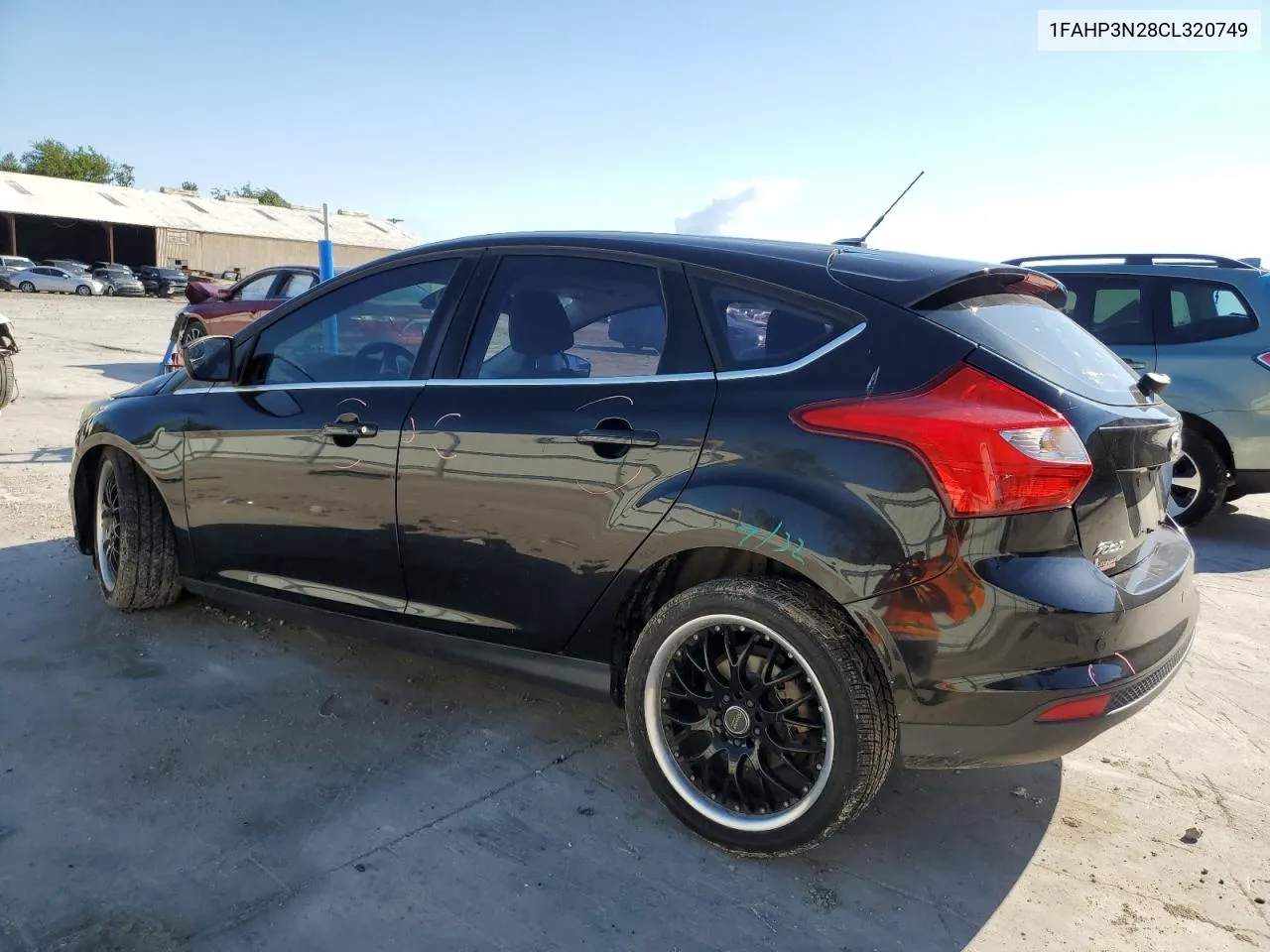 2012 Ford Focus Titanium VIN: 1FAHP3N28CL320749 Lot: 71052464