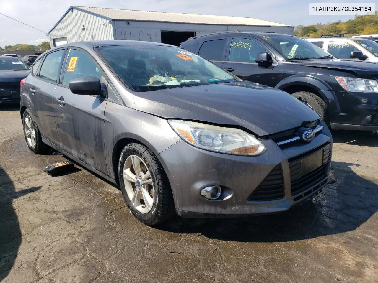 2012 Ford Focus Se VIN: 1FAHP3K27CL354184 Lot: 71704094