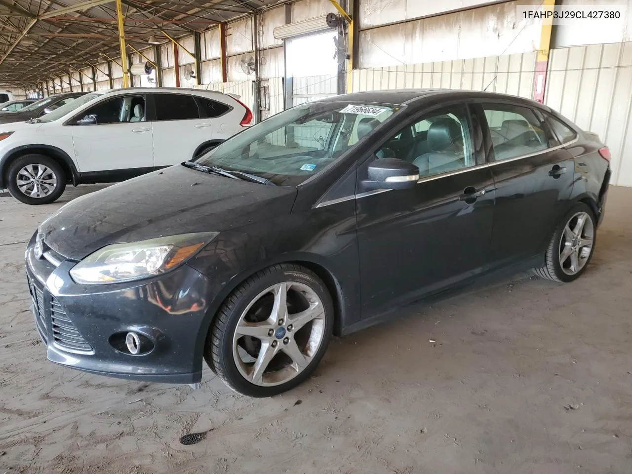 2012 Ford Focus Titanium VIN: 1FAHP3J29CL427380 Lot: 71966634