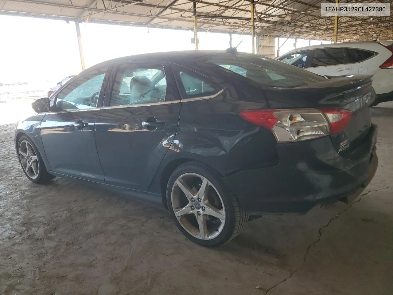 2012 Ford Focus Titanium VIN: 1FAHP3J29CL427380 Lot: 71966634