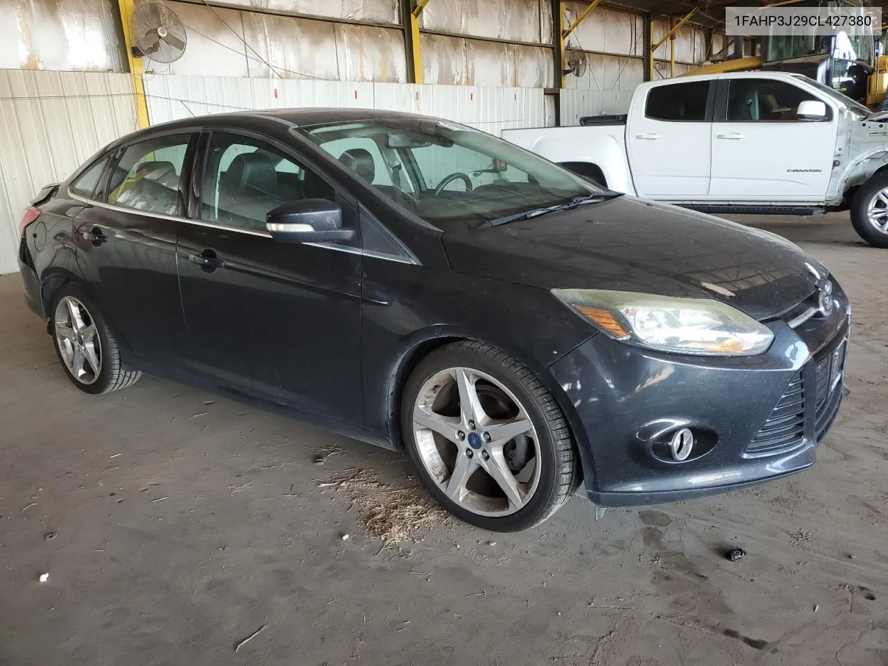 2012 Ford Focus Titanium VIN: 1FAHP3J29CL427380 Lot: 71966634